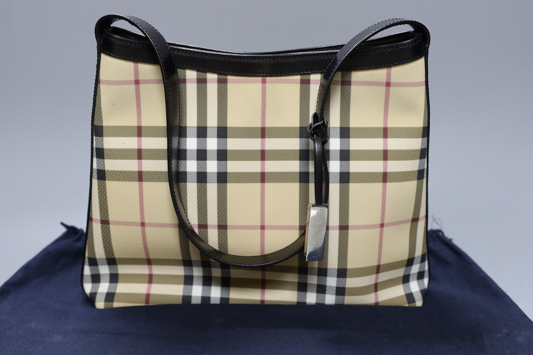 A Burberry shoulder bag with original receipt and dust bag, 24 cms high x 30 cms wide